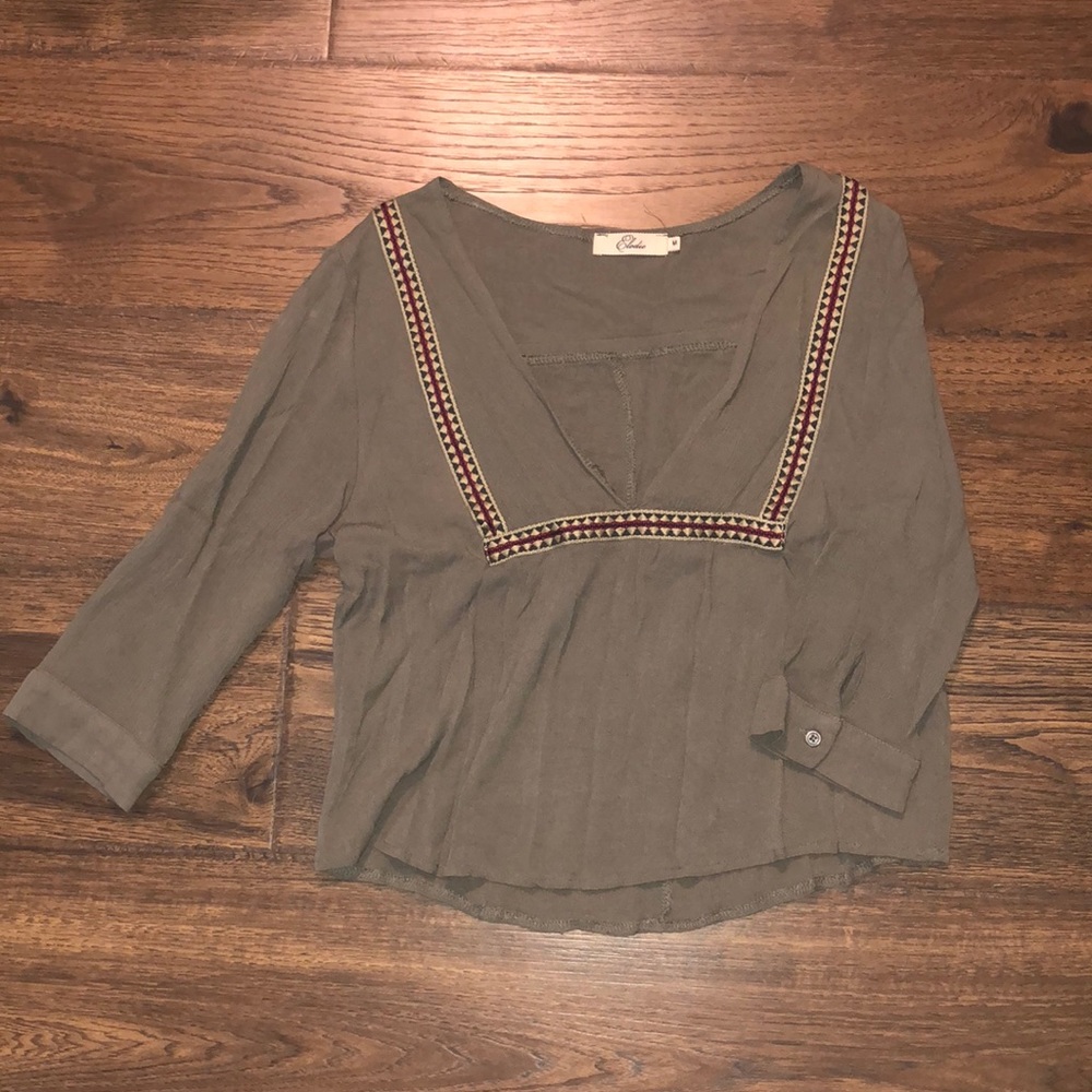 Green v-neck blouse